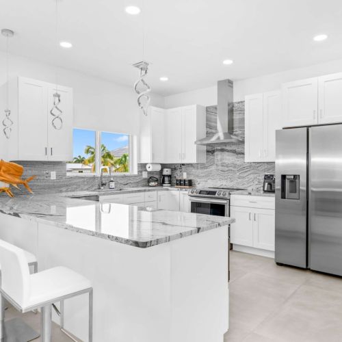 Cook together, laugh together. The island becomes the hangout spot.