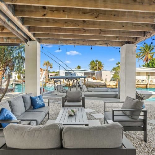 Sip cocktails in style on the sleek patio with stunning waterfront views!