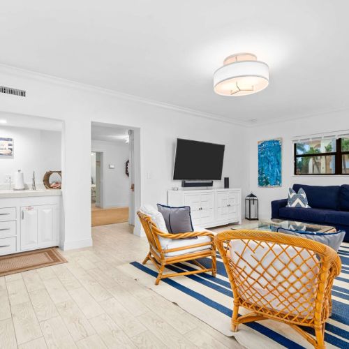 Second lounge space to spread out. Movies, drinks from the wet bar and easy access to the pool.