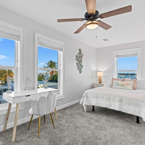 Wake up to breathtaking water views and stylish coastal decor!