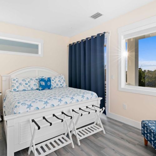 This stylish bedroom is the perfect spot to unwind after a day of adventures. With plush bedding and a serene ambiance, you’ll feel right at home. Get ready to relax in comfort and style!