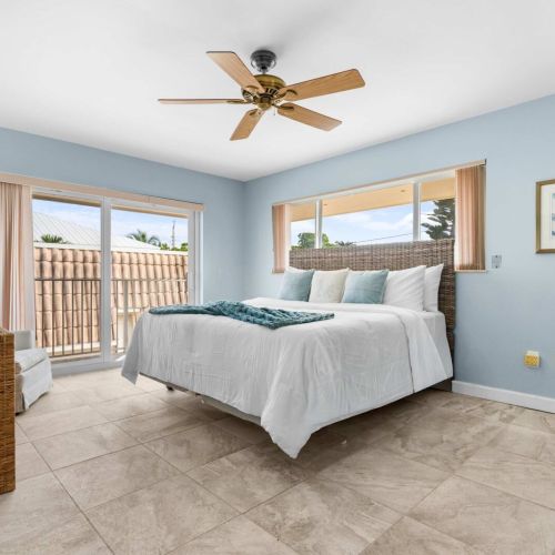 Wake to sunlight and palm views in your master suite.
