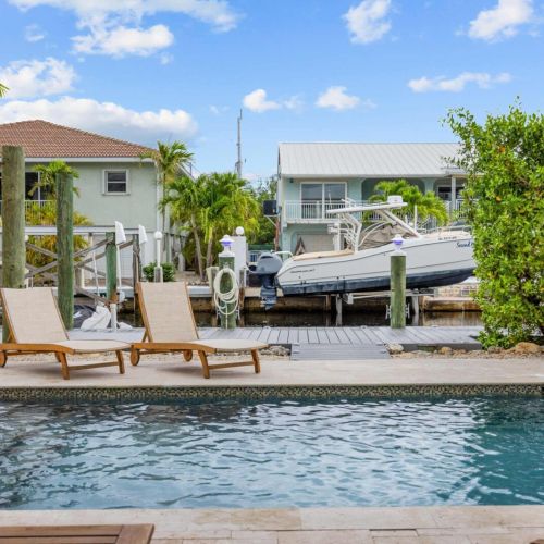 Pool & dock: float in the pool with your boat lift and the canal just steps away.