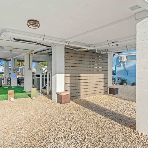 Unwind in style with shaded seating and a tropical vibe perfect for relaxation!