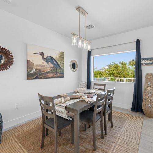 Gather around the table in our stylish and inviting dining area.