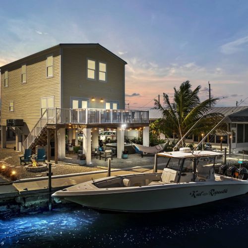 Bask in stunning sunsets from your private dock with a boat ready to explore!