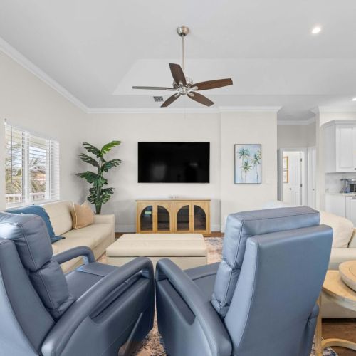 Open living: the lounge flows into the kitchen so no one misses the conversation.