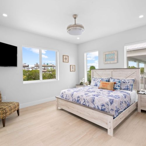 Dreaming of a peaceful retreat? Look no further than a tidy bed and a high-definition tv in your bedroom