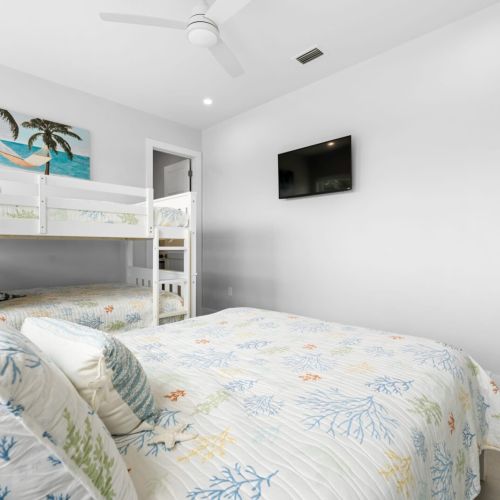 Sink into a cloud-like mattress and drift off into a peaceful slumber in the lovely bedroom.