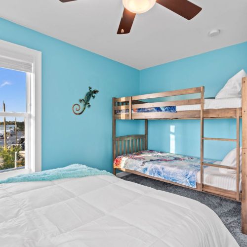 Wake up to breathtaking marina views in this vibrant, beach-inspired retreat!