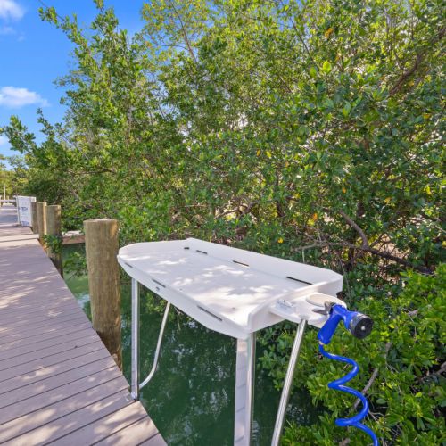 Prepare your bait at the fishing table.