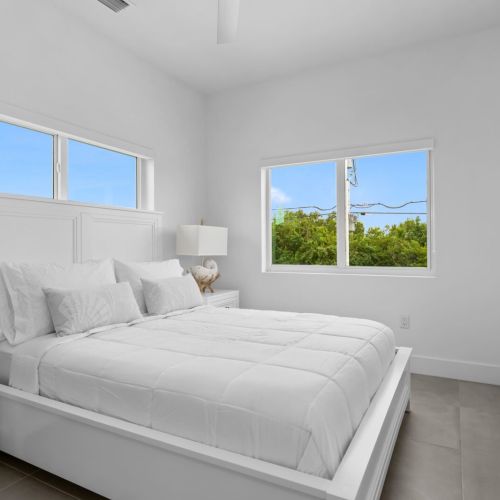 Cozy king room with natural light and relaxing vibes