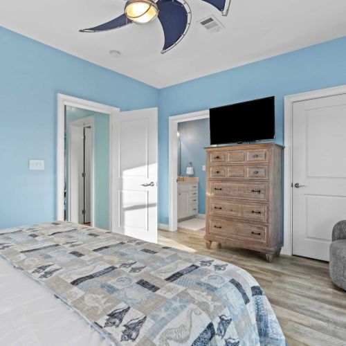 Bright blue walls and sunny views create your perfect island getaway!