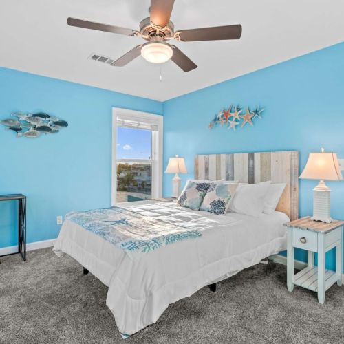 Enjoy vibrant turquoise walls, serene decor, and stunning marina vistas!
