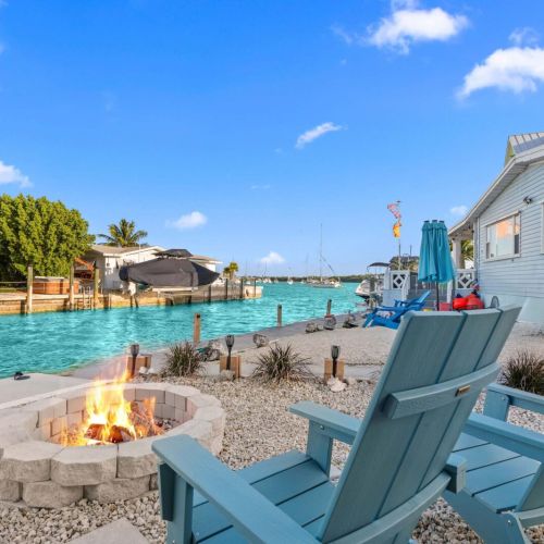 Gather around the fire pit after a day of adventures, amidst tropical vibes!