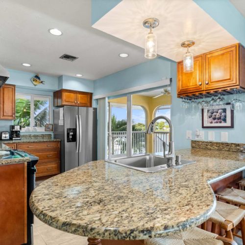 Bar stools, granite counters, and conversation that lasts late into the night.