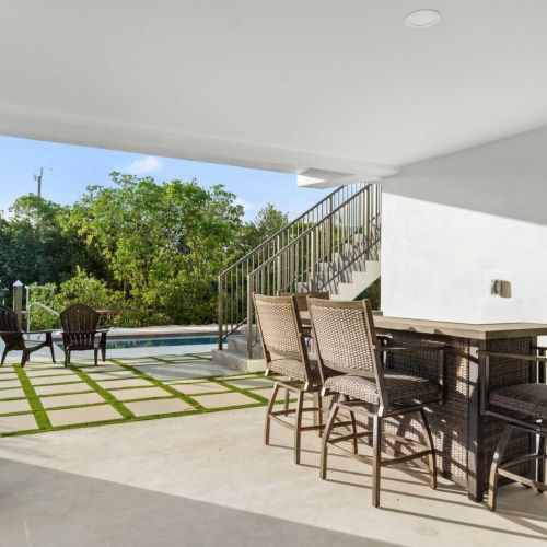 Covered comfort meets open-air living. This is where evenings stretch a little longer.