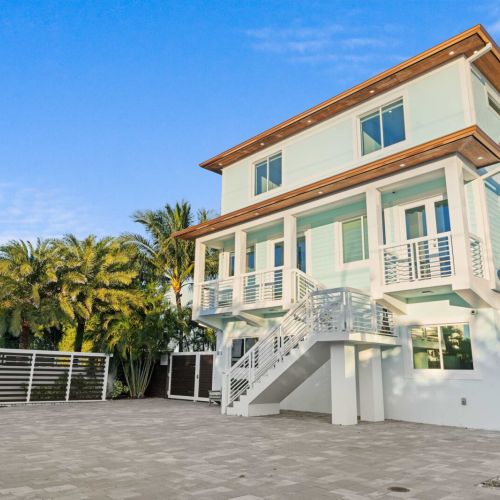 Step into your next adventure! This charming building with a stunning staircase is just waiting to welcome you.