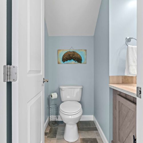 Bright, beachy vibes with charming decor—perfect for freshening up after a day of fun!