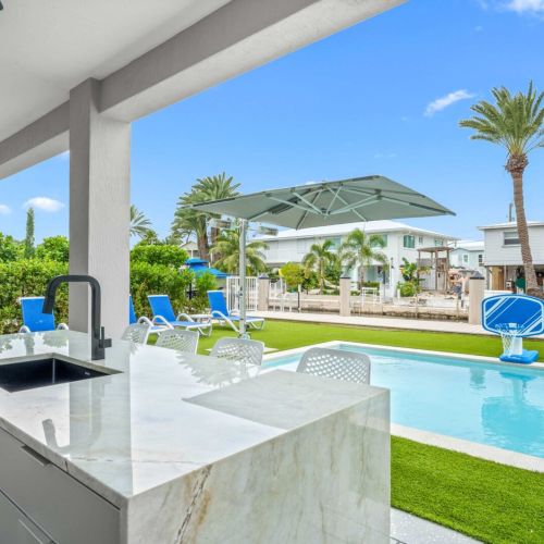 Someone’s grilling, someone’s swimming, everyone’s laughing. The whole day happens right here.