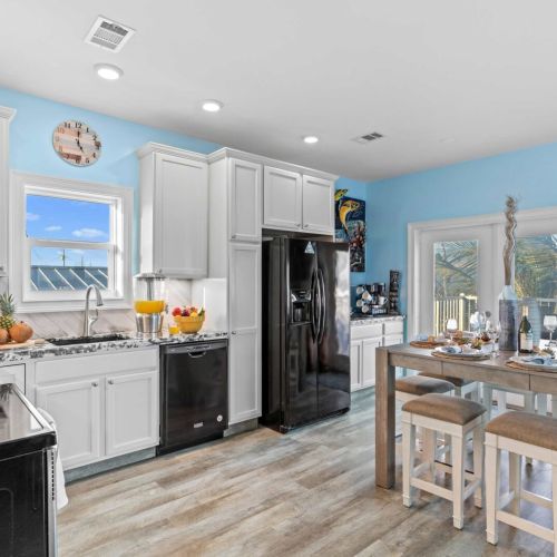 With bright walls and a welcoming dining area, it's perfect for hosting gatherings or enjoying quiet mornings with a view.