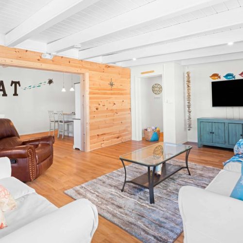 Welcome to your cozy retreat! Kick back in our spacious living room, where comfy couches and a big tv are just waiting for you. Perfect for movie nights or relaxing with friends. Eat, relax, and enjoy your stay!