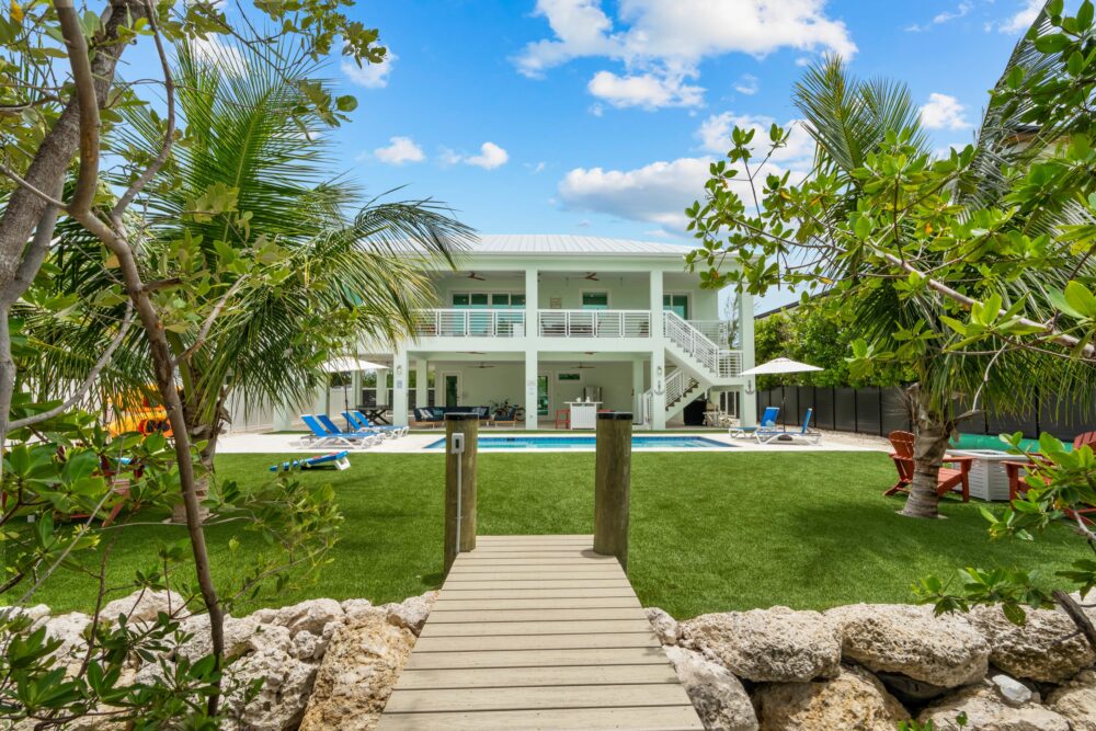 Maximizing summer performance: why q2 is the golden window for luxury vacation rentals 3 Emerald oasis ~ lux waterfront gem ~ pool ~ kayaks main image