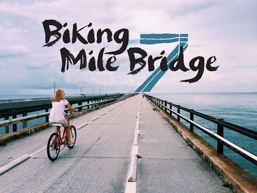 Cyclist riding across the historic Old Seven Mile Bridge, a renowned landmark connecting the Middle and Lower Florida Keys in Marathon.